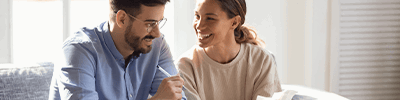 Compare Internet Providers SA 1 couple talking happy with laptop mobile